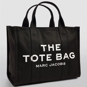 The Marc Jacobs traveler tote.  Small size. NWT